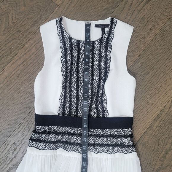 BCBGMAXAZRIA Adelyn Pleated Lace Sleeveless Hi Low Dress in White & Black - Picture 14 of 16